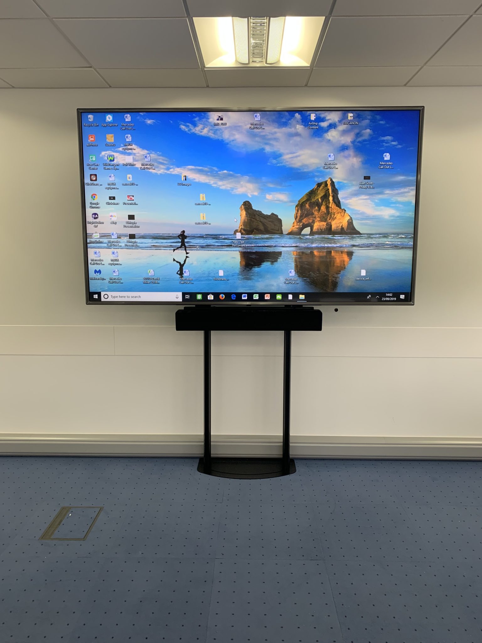 75" display on a floor/wall support